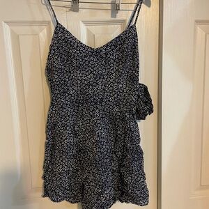 Arizona Woman’s romper. Size small. Blue and white flowers. Brand new.